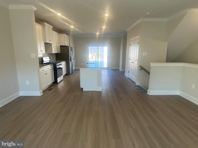 kitchen with dark hardwood / wood-style flooring, a center island with sink, white cabinets, and white gas range oven