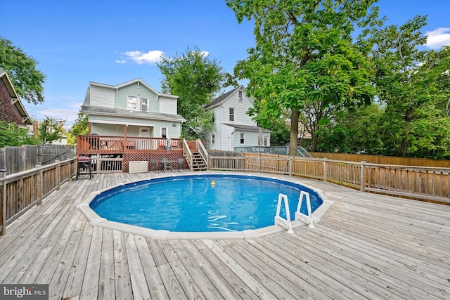 view of pool with a deck