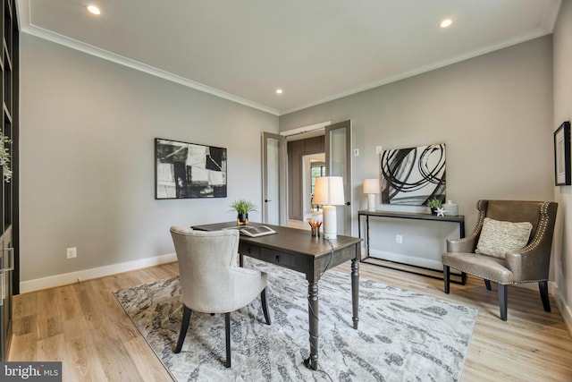 office space featuring light hardwood / wood-style floors and ornamental molding