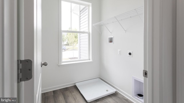 laundry area with hookup for a washing machine, wood-type flooring, and hookup for an electric dryer