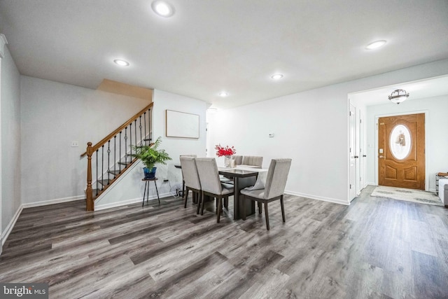 dining room with dark hardwood / wood-style floors