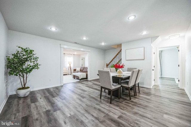 dining area featuring wood-type flooring