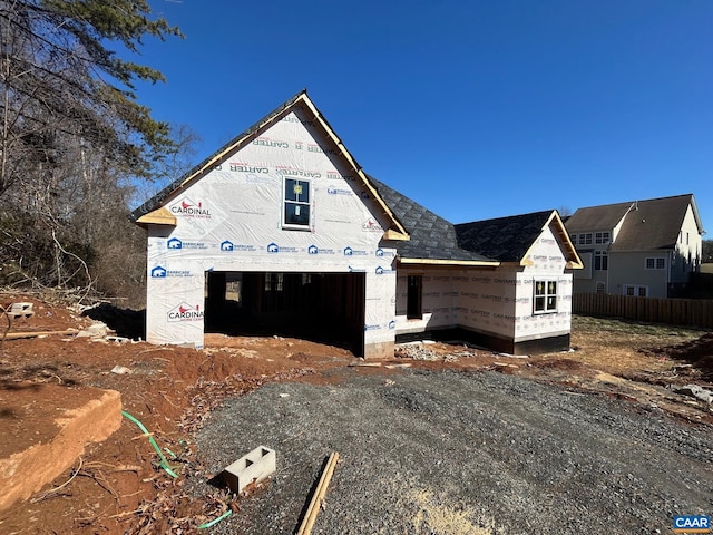 property under construction featuring fence