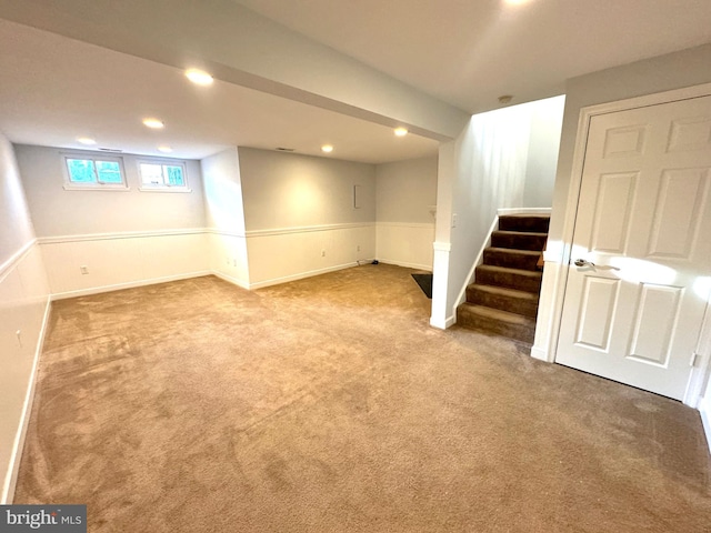 basement featuring carpet flooring