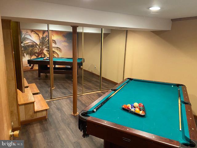 recreation room with dark hardwood / wood-style flooring and pool table