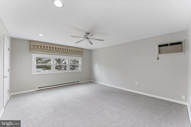 carpeted spare room featuring ceiling fan, a baseboard radiator, and a wall mounted AC