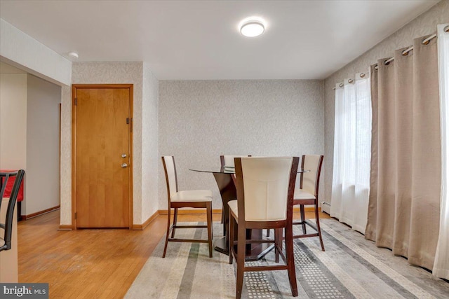 dining room featuring light hardwood / wood-style floors