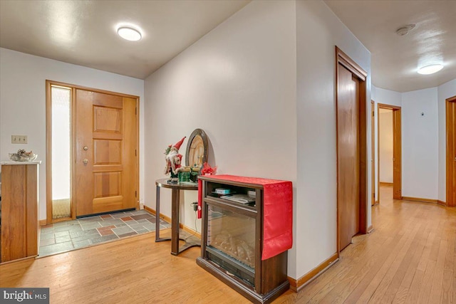 entrance foyer with light wood-type flooring