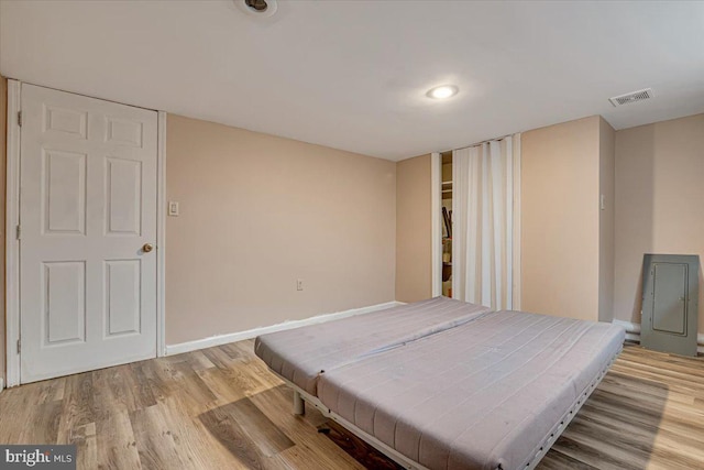 bedroom featuring light wood-type flooring