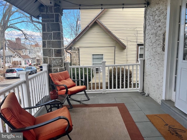 balcony featuring covered porch