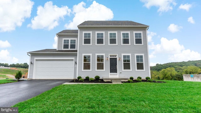 view of front of home with a front yard