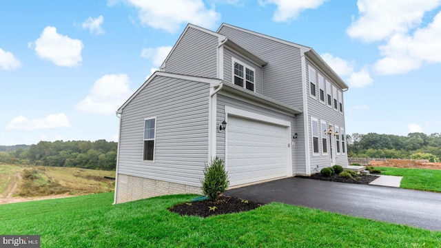 view of property exterior featuring a garage and a yard