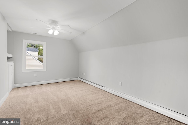 bonus room with ceiling fan, carpet floors, and vaulted ceiling