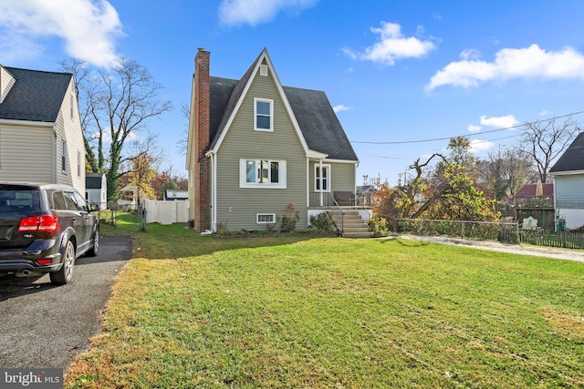 exterior space featuring a front lawn