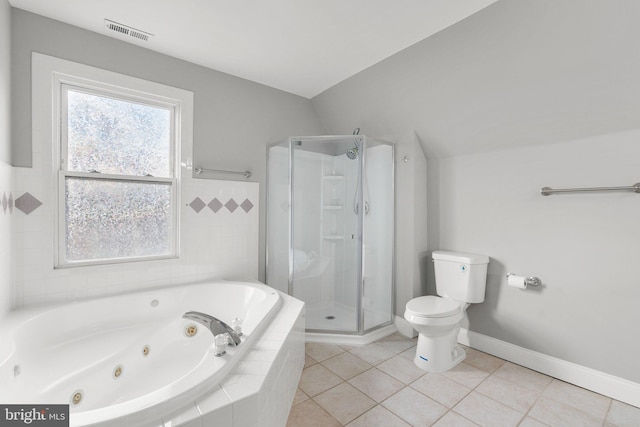 bathroom with tile patterned flooring, toilet, independent shower and bath, and vaulted ceiling