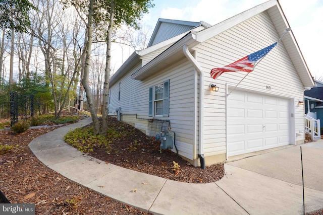 view of home's exterior with a garage