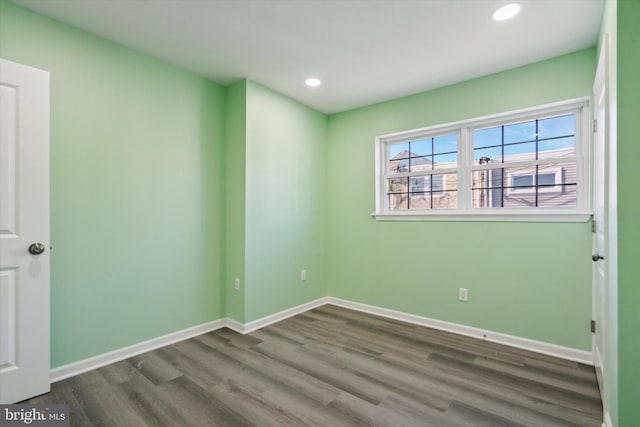 empty room featuring dark hardwood / wood-style floors