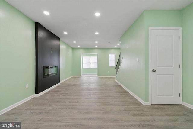 unfurnished room featuring light hardwood / wood-style floors