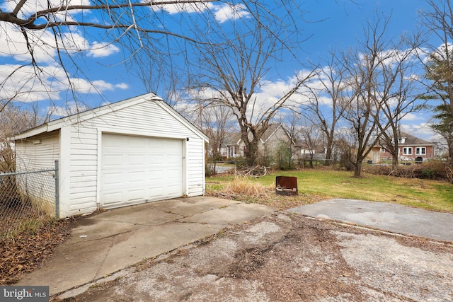 garage featuring a yard