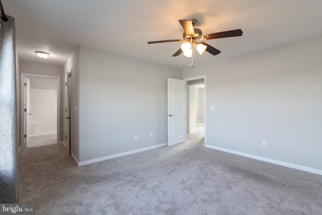 empty room with carpet and ceiling fan