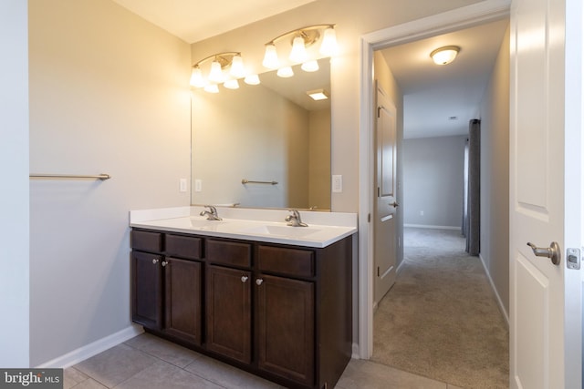 bathroom with tile patterned flooring and vanity