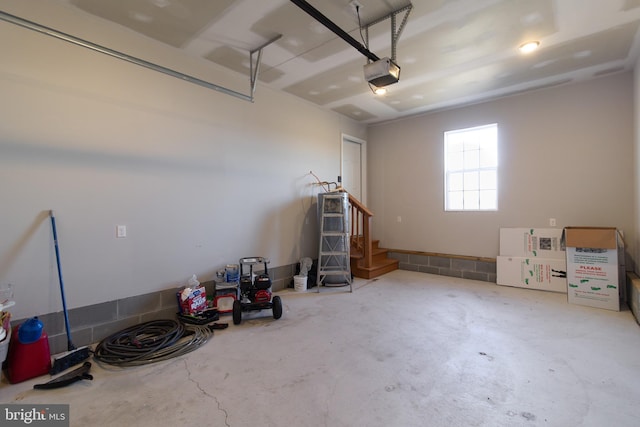 garage featuring a garage door opener