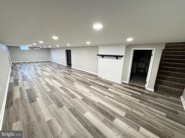 basement featuring light hardwood / wood-style floors