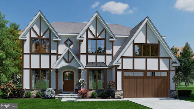 tudor-style house with a front lawn and a garage