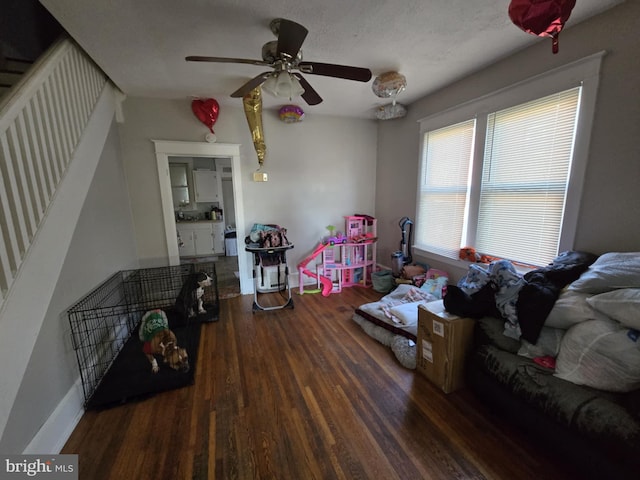 interior space featuring dark hardwood / wood-style floors and ceiling fan