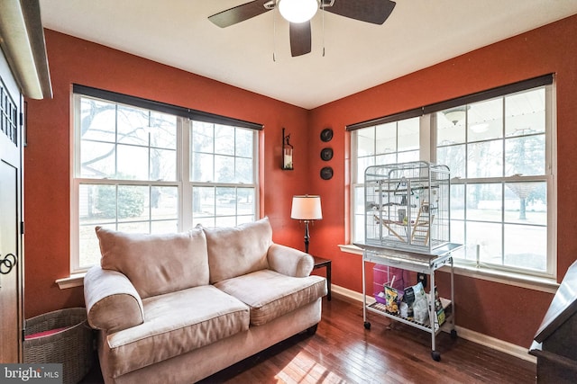 living room with ceiling fan, a healthy amount of sunlight, and hardwood / wood-style flooring