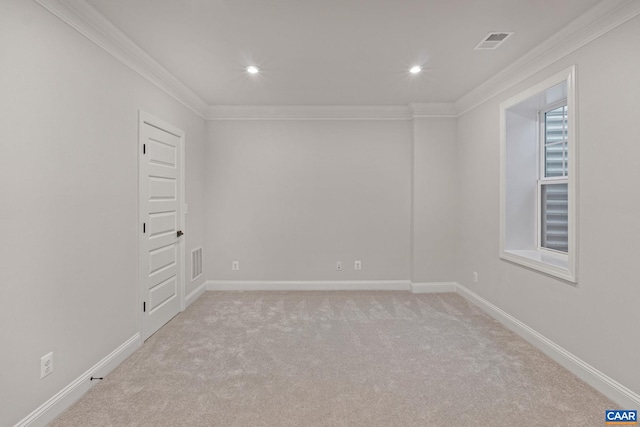 unfurnished room featuring light carpet, plenty of natural light, and ornamental molding