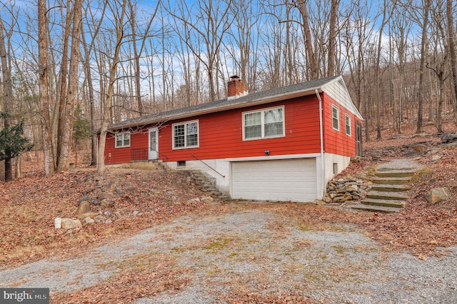 view of property exterior featuring a garage