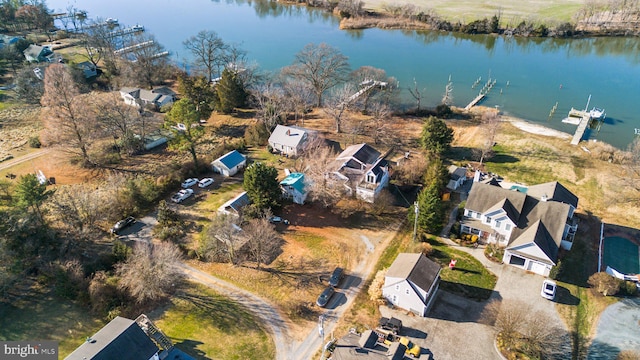 drone / aerial view with a water view