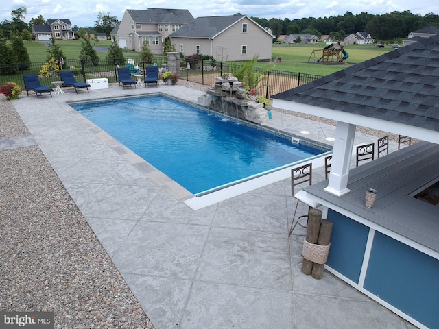 view of pool featuring a patio area