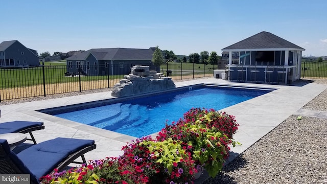 view of swimming pool featuring a patio area