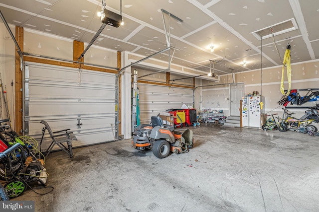 garage featuring a garage door opener