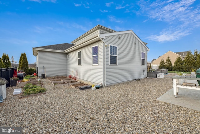 back of property with a patio