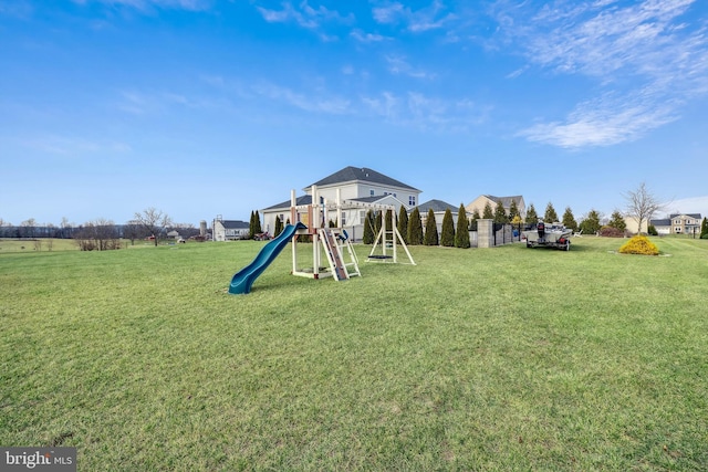 view of jungle gym with a yard