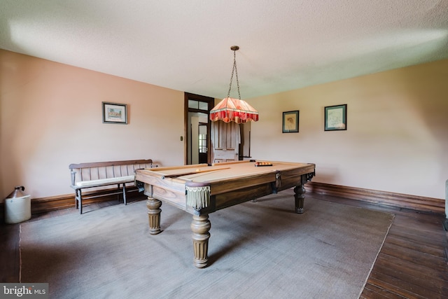 playroom with dark wood-type flooring, a textured ceiling, and billiards