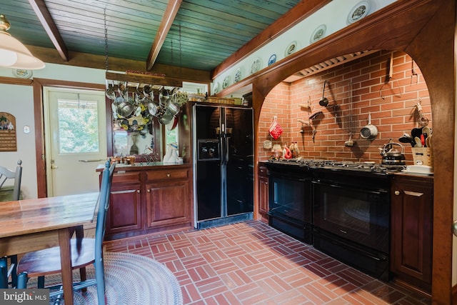 kitchen with beamed ceiling, wooden ceiling, and black appliances