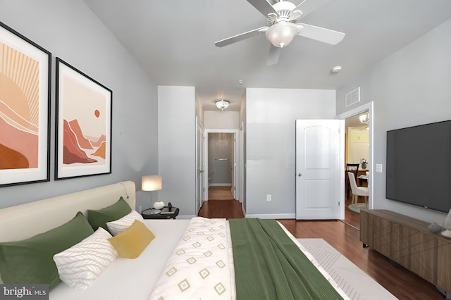 bedroom featuring ceiling fan and wood-type flooring