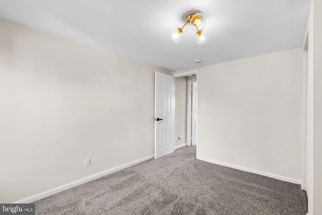 unfurnished room featuring carpet floors