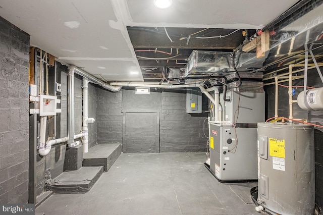 basement with heating unit, electric water heater, and electric panel