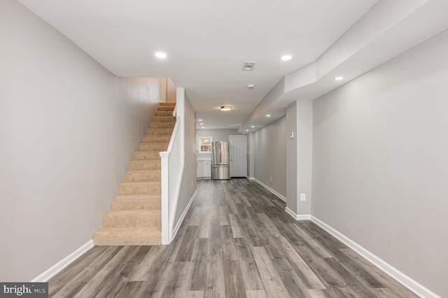 hallway featuring hardwood / wood-style floors