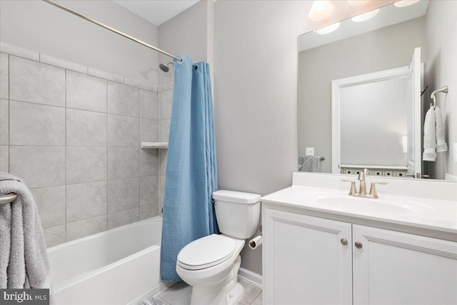 full bathroom with vanity, toilet, and shower / tub combo with curtain