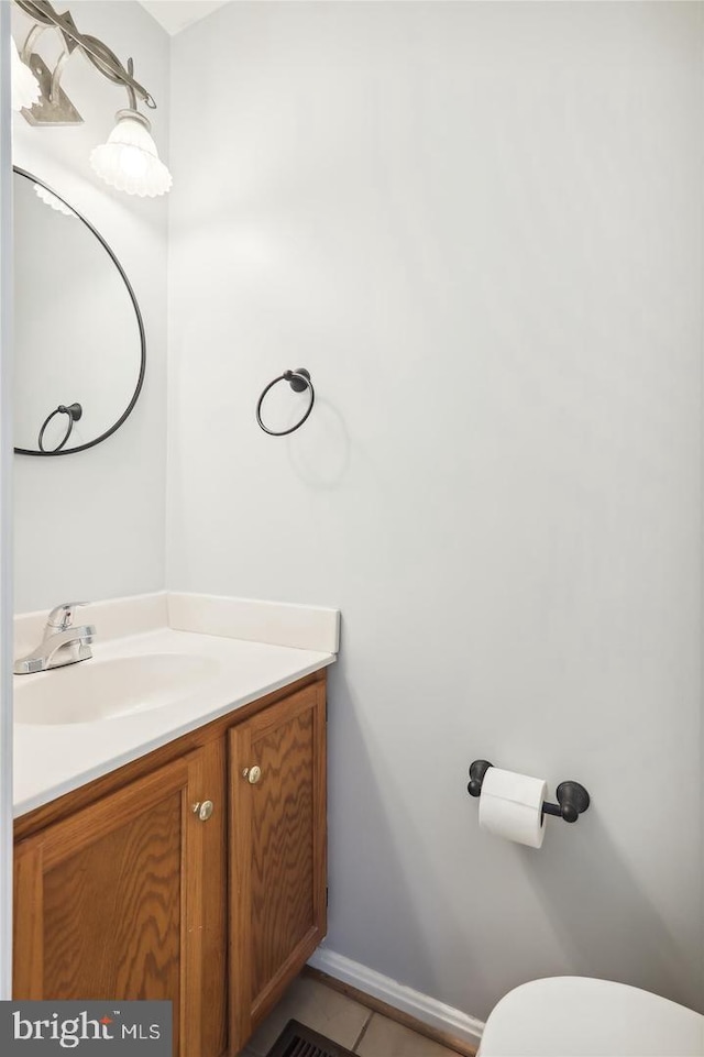 bathroom featuring tile patterned floors and vanity