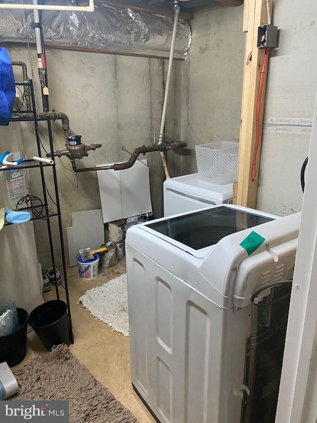 clothes washing area featuring washer / clothes dryer