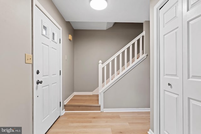 entrance foyer with light wood-type flooring