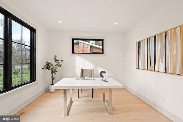 home office featuring recessed lighting, baseboards, and wood finished floors