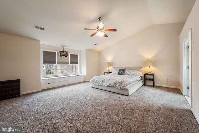 carpeted bedroom featuring ceiling fan and vaulted ceiling